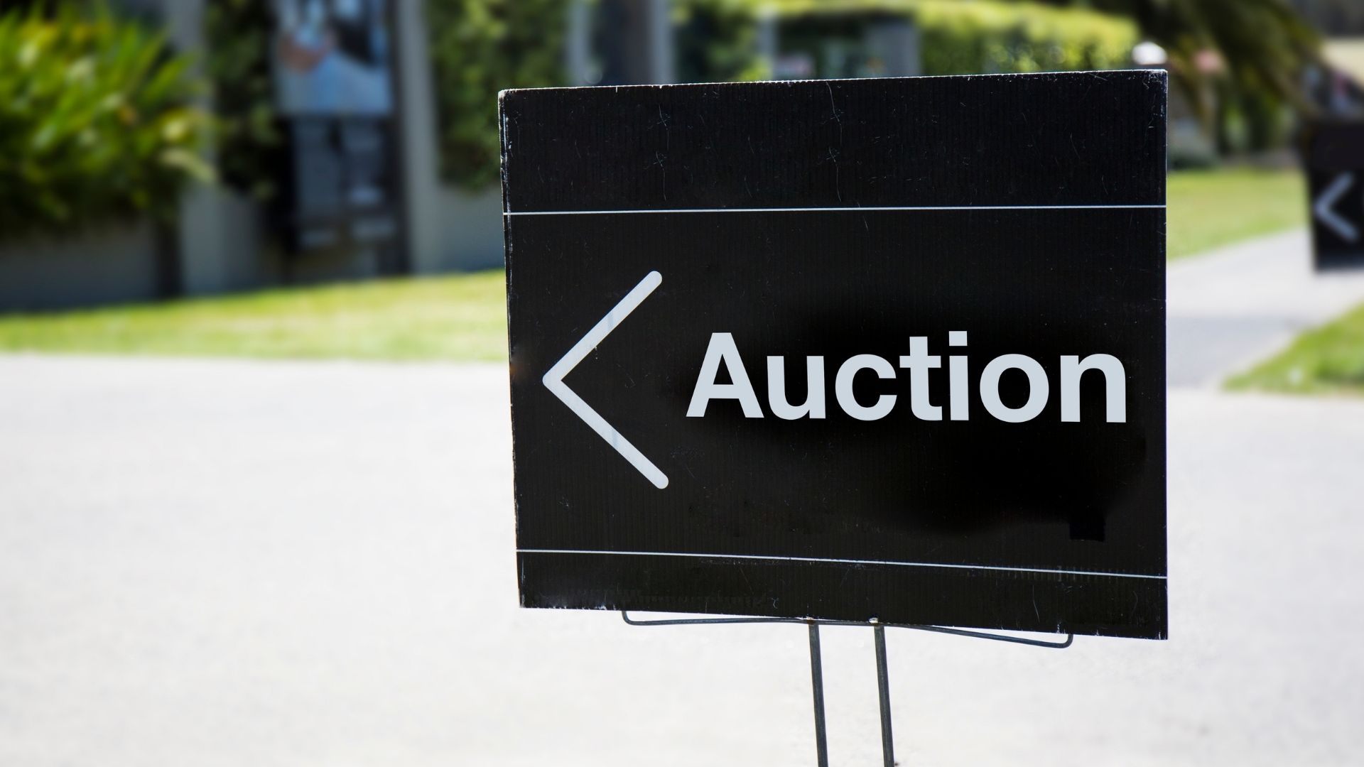 A neighborhood auction sign